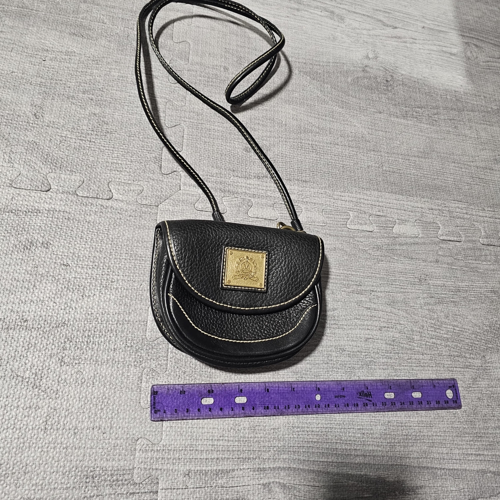 Stylish Black Crossbody Bag with Gold Detail
